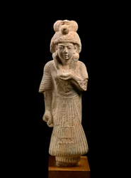 Schreiber und Priester des Thoth, der einen Pavian trägt, aus Ashmunein, altes Hermopolis, Neues Reich, XIX. Dynastie, 1307-1196 v. Chr. (Kalkstein)